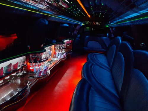18 passenger Cadillac
                        Escalade limousine Krakow Airport interior 1